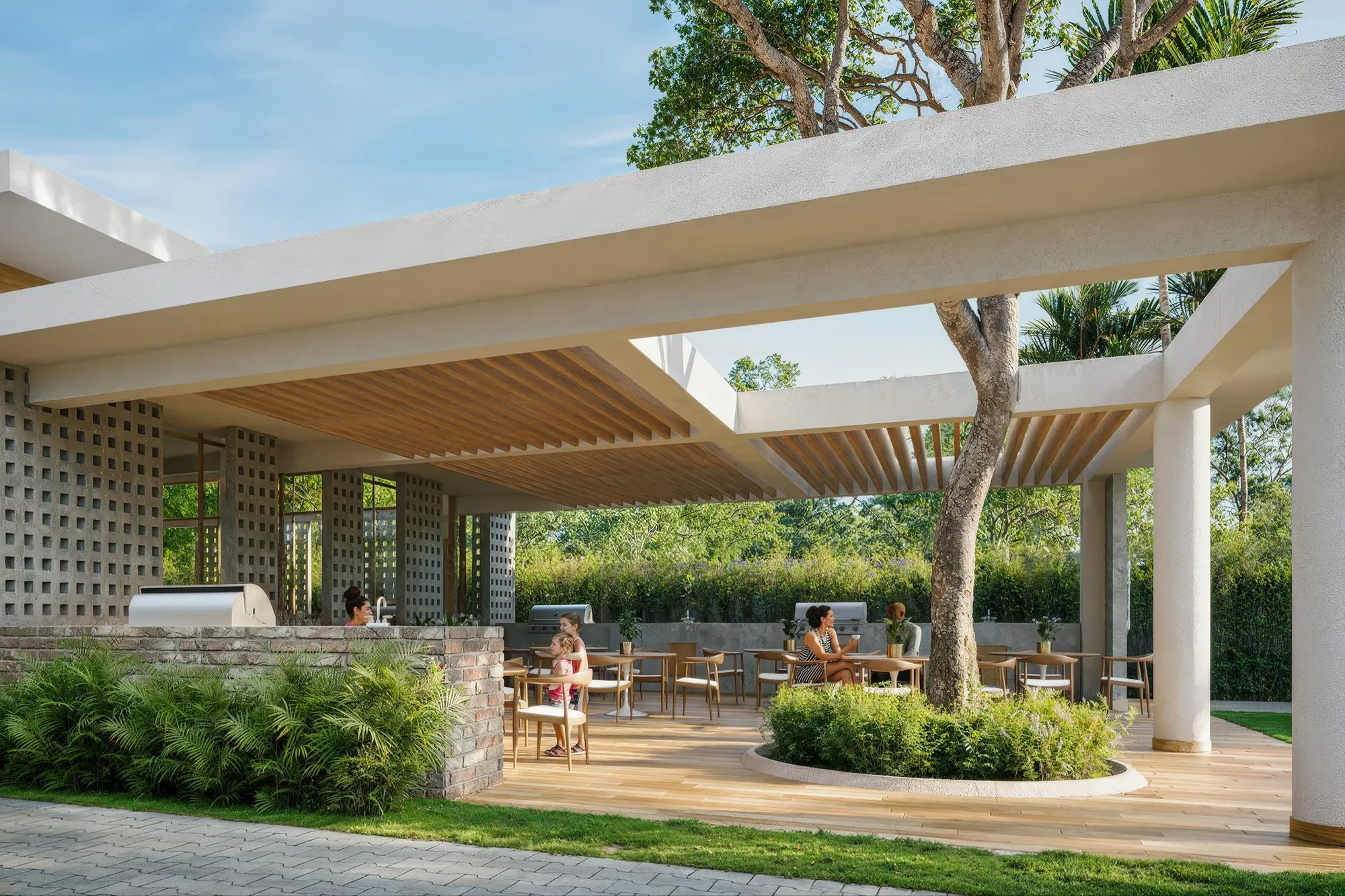 Brisas 6 clubhouse terrace with pergola, tables and BBQ area
