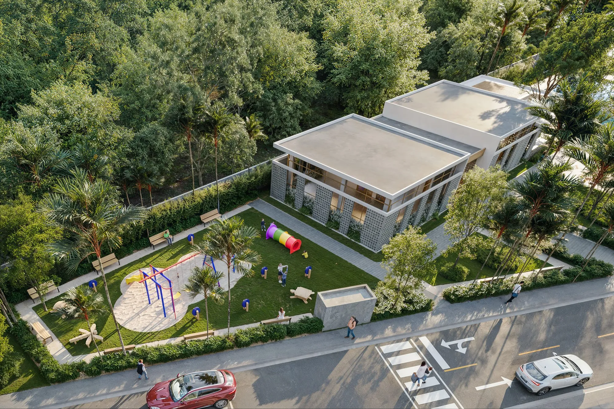 Aerial view of the Brisas 6 kids club with its playground among the trees